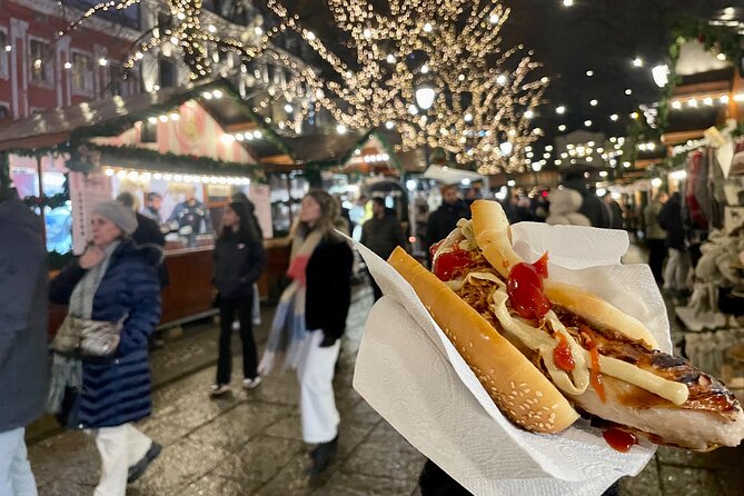 Christmas Street Food Tour With Akevitt and Christmas Beer - Tour Guide Insights and Narratives