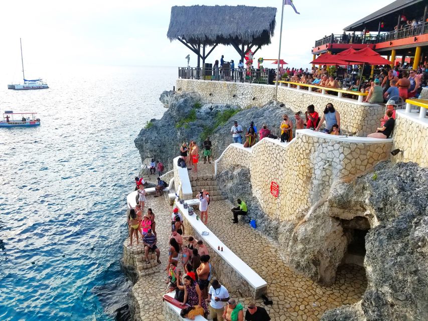 From Runaway Bay: Negril Beach and Rick's Cafe Trip by Van - Green Grotto Caves and Puerto Seco Beach