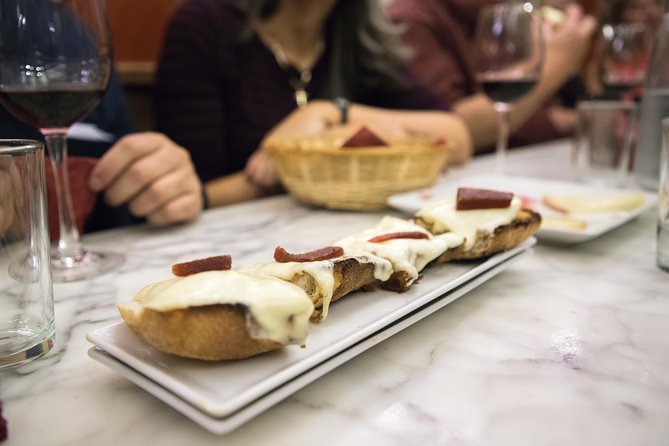 Madrid Tapas and Wine Tasting Tour - Atmosphere and Recommendations