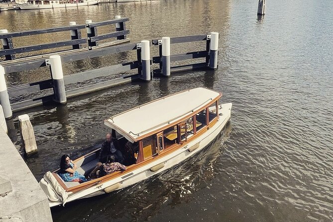 Private Boat Tour: Champagne Canal Cruise in Amsterdam - Pricing and Booking Information