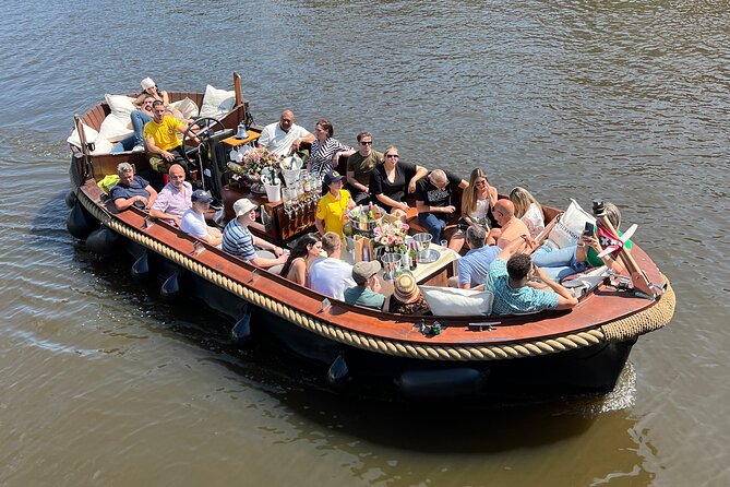 Amsterdam Luxury Boutique Boat Tour With Unlimited Beer and Wine - Directions and Cancellation Policy