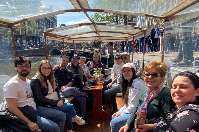 Dutch Cheese and Drinks Guided Amsterdam Boat Tour - Amsterdam Canal Experience