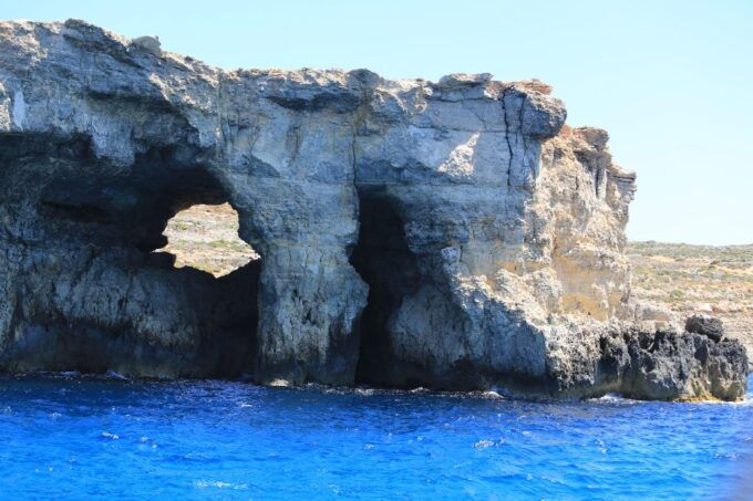 Malta: Comino, Blue Lagoon, and Caves Day Trip - Highlights of the Experience