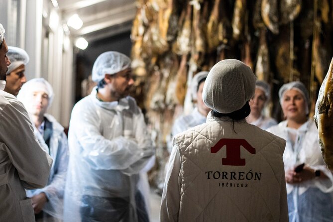 Private Visit to a Ham Factory With Show Cooking in Salamanca - Cancellation Policy Details