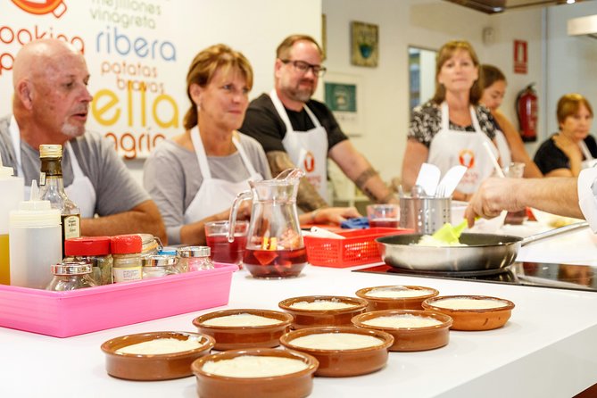 Spanish Cooking Class: Paella, Tapas & Sangria in Madrid - Market Visits and Culinary Instructors