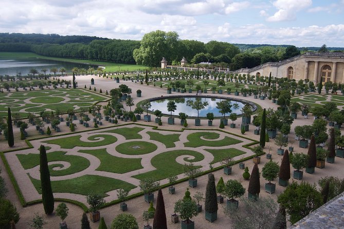 Versailles Palace and Gardens Tour by Train From Paris With Skip-The-Line - Guided Tour and Historical Insights
