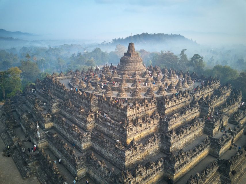 Yogyakarta: Borobudur & Prambanan Guided Tour W/ Entry Fees - Visitor Reviews and Transportation