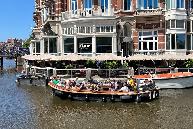 Amsterdam Luxury Boutique Boat Tour With Unlimited Beer and Wine - Price and Booking Information
