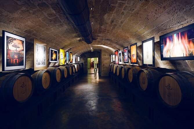 Audio Guided Tour and Wine Tasting at Caves Du Louvre - Cancellation Policy Details
