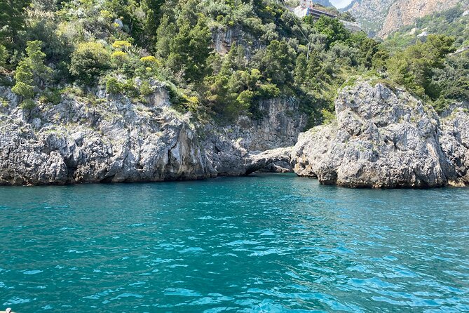 Boat Tour of the Amalfi Coast With Aperitif - Guides and Itinerary Details