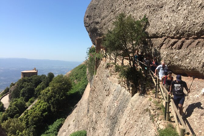 Historical Montserrat Half-Day Hiking Tour From Barcelona - Local Guide and Scenic Hiking