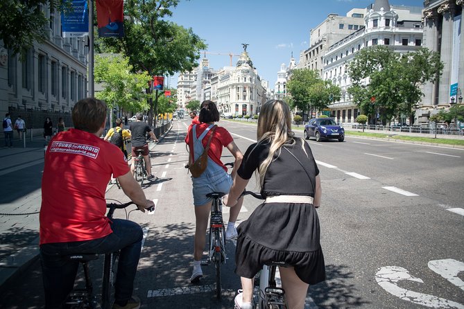 Madrid by Bike or E- Bike With Optional Tapas - Offered Languages and Group Size