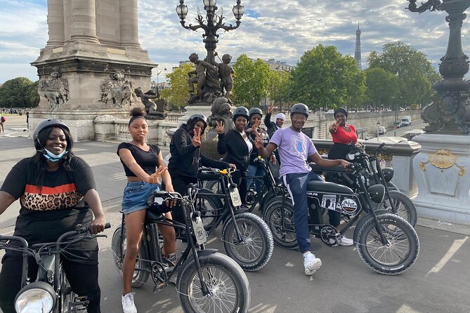 Paris Sightseeing Family Friendly Guided Electric Bike Tour - Sightseeing Stops and Attractions