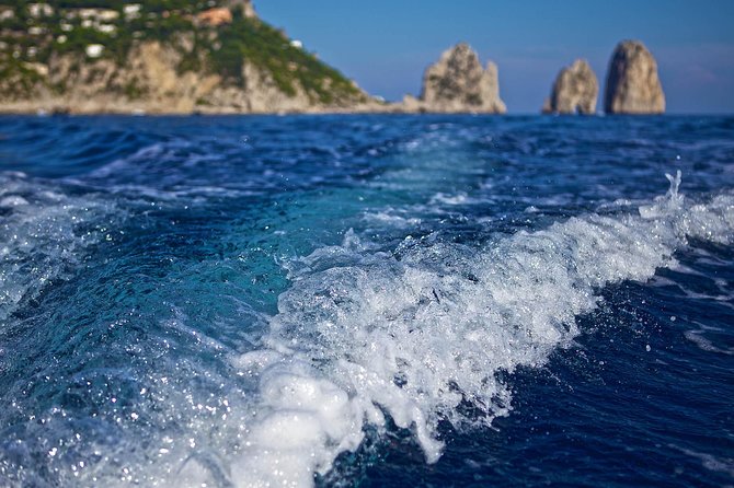 Small Group Capri Island Boat Ride With Swimming and Limoncello - Island Exploration and Swimming