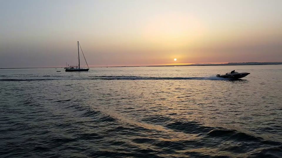 Faro: Ria Formosa Guided Sunset Tour by Catamaran - Cancellation Policy and Meeting Point