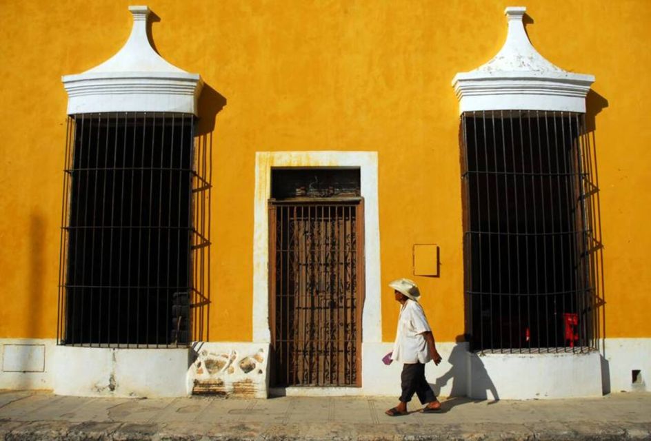 From Merida: Izamal and Valladolid Guide Tour & Yucatan Meal - Cenotes Visited