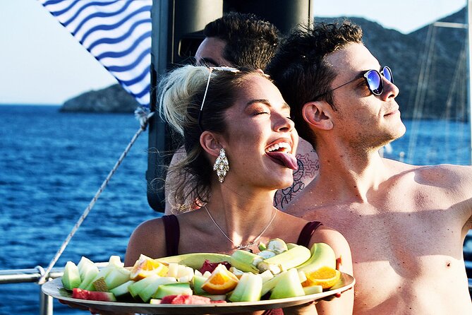 Mykonos Party Boat With DJ, Open Bar, and Swim Break (Mar ) - Common questions