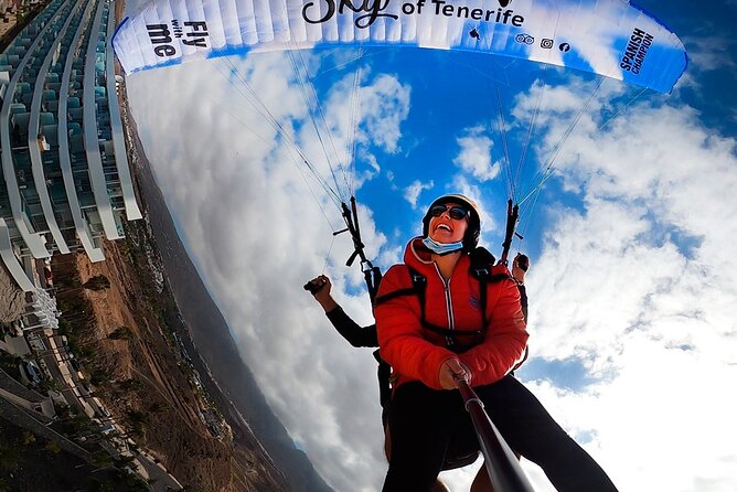 Acrobatic Paragliding Flight With Spanish Champion in Tenerife - Key Points