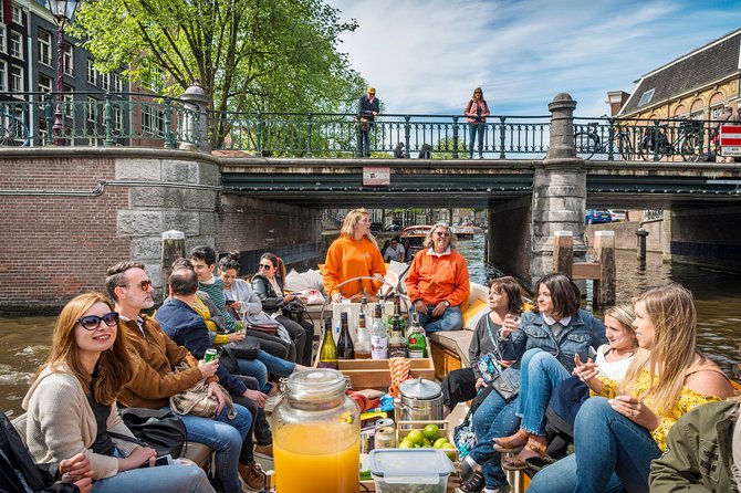 Amsterdam Canal Cruise With Live Guide and Onboard Bar - Key Points