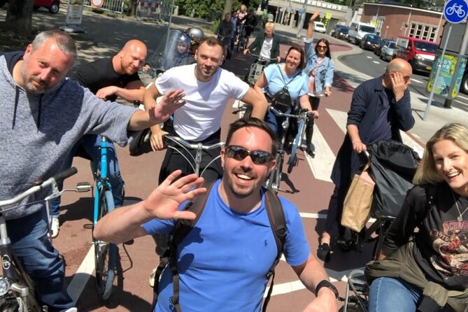 Amsterdam City Highlights Guided Bike Tour - Key Points