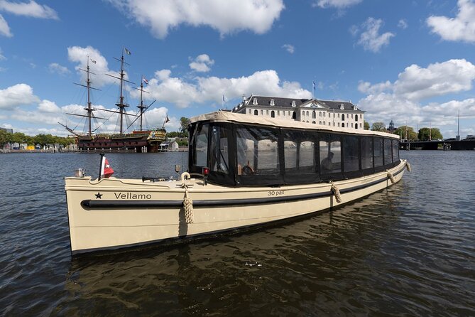 Amsterdam: Luxury Guided Boat Tour Stroopwafels and Drinks! - Tour Highlights and Inclusions
