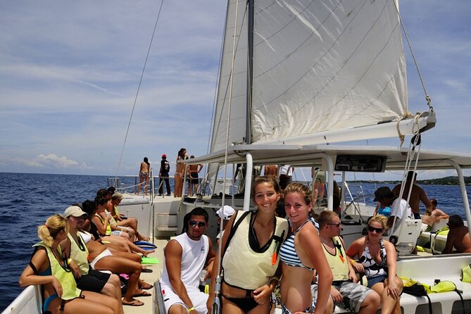 Catamaran Cruise, Open Bar, Food and Snorkeling - Key Points