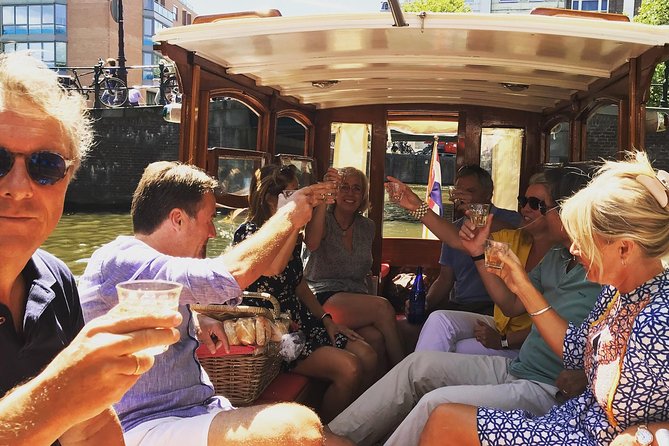 Cultural Tour in French With an Aperitif on a Historic Boat - Key Points