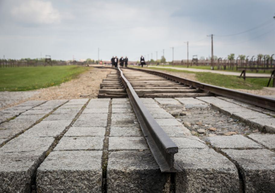 From Krakow: Auschwitz Birkenau Tour With Transportation - Tour Duration and Inclusions