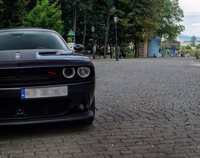 Krakow: Private Airport Transfer by 500 HP Dodge Challenger - Key Points