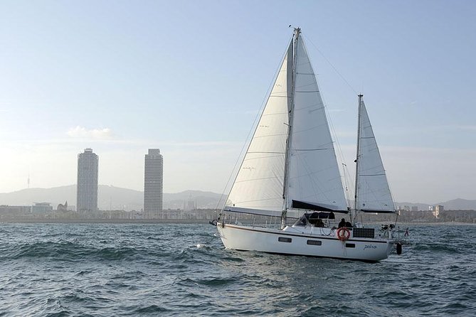 Look at Barcelona From a Sailing Boat With Tapas and Drinks - Key Points