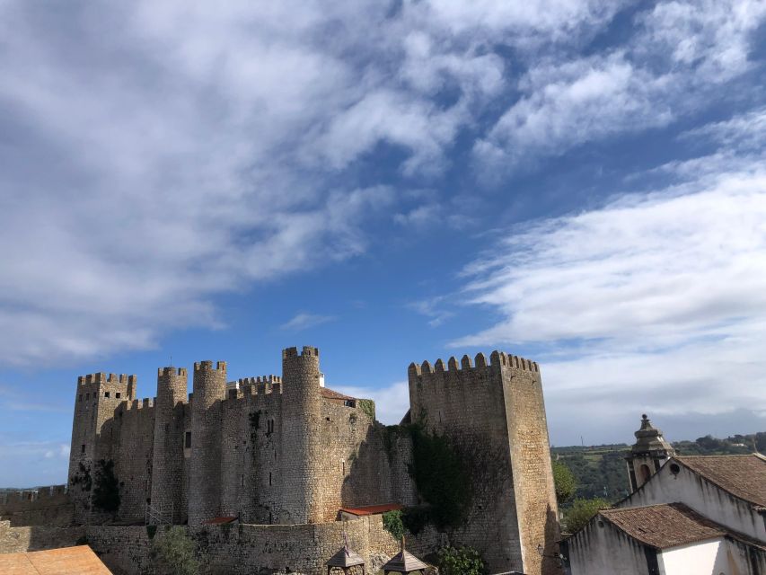Nazaré: Big Wave Capital & Medieval Óbidos Tour From Lisbon - Key Points