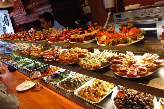 Night Tapas Walking Tour in Barcelona Modernist Area With Small Group and Dinner - Key Points