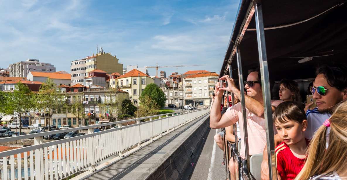 Porto: City Train Tour, River Cruise & Wine Cellar - Key Points