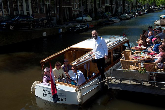 Private Guided Historic Amsterdam Canal Cruise in a Salon Boat - Tour Highlights