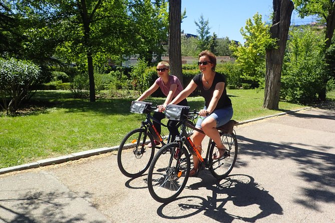 Private Madrid City Tour Bike or E-Bike Exclusive Guided Tour - Key Points