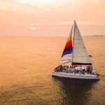 sunset dolphin catamaran cruise with island time Sunset & Dolphin Catamaran Cruise With Island Time