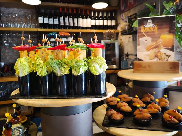 Tapas & Wine, Private Tour in Barcelona'S Traditional Taverns - Key Points