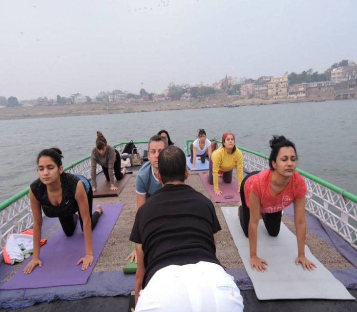 Varanasi: Morning Guided Boat Ride With Yoga - Key Points