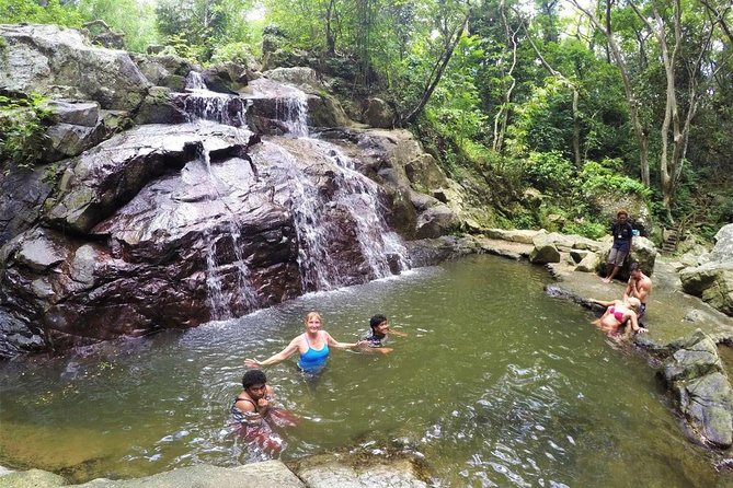 Zip Line Walk to Waterfall & Swimming Mud Pools Combo Tour - Key Points