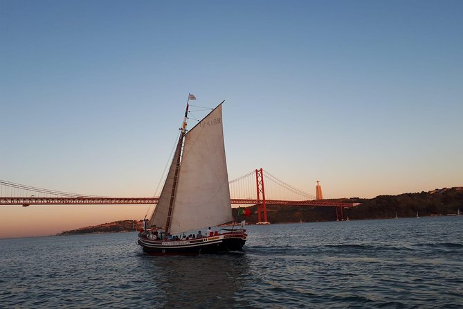 1 2 hour lisbon traditional boats sunset cruise with white wine 2-Hour Lisbon Traditional Boats Sunset Cruise With White Wine