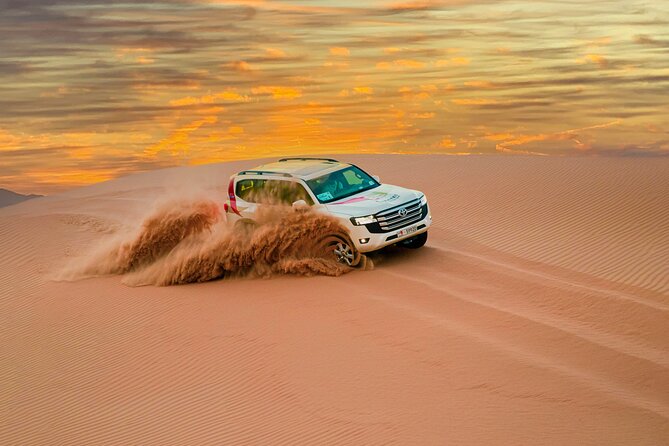 Abu Dhabi Morning Desert Safari: 4×4 Dune Bashing, Camel Ride and Sandboarding