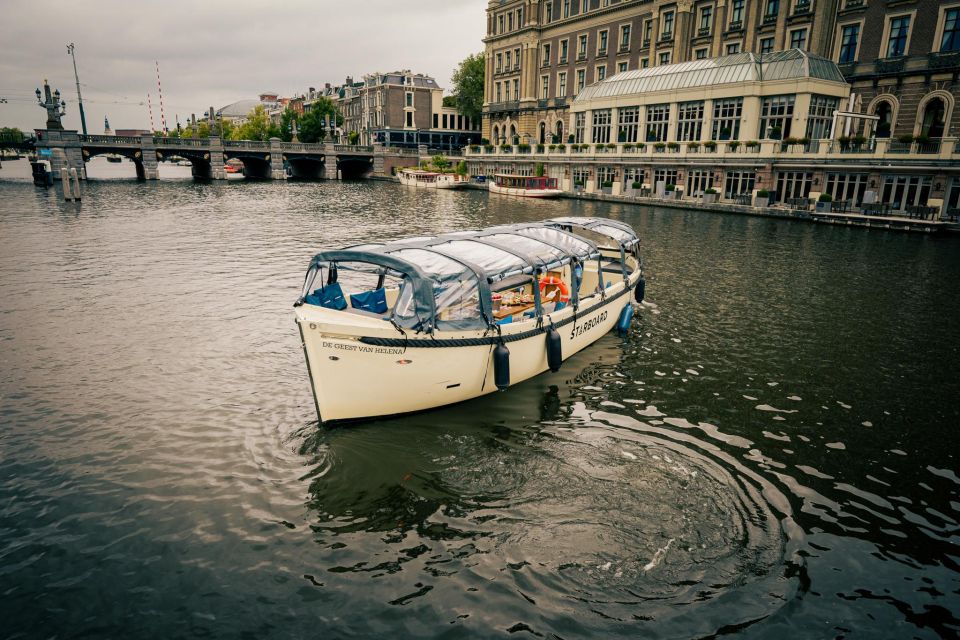 Amsterdam: Canal Booze Cruise With Unlimited Drinks