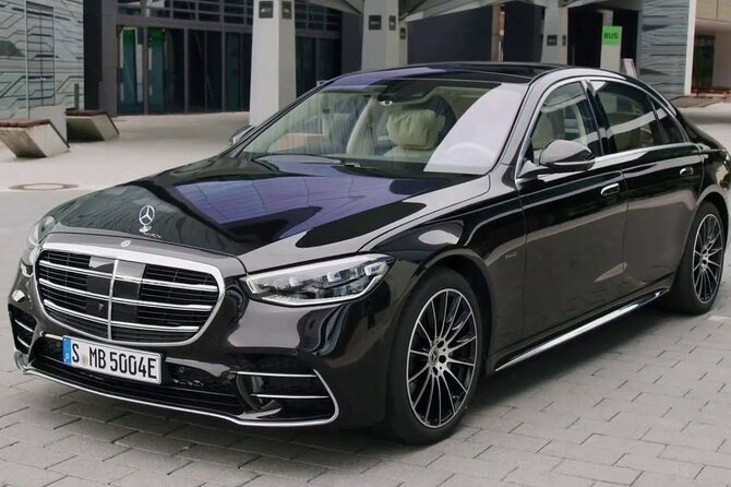 Amsterdam City Departure Private Transfer to Amsterdam Train Station in Luxury Car