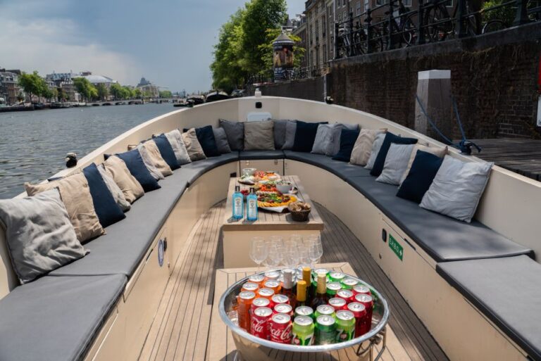 Amsterdam: Private Canal Booze Cruise With Unlimited Drinks