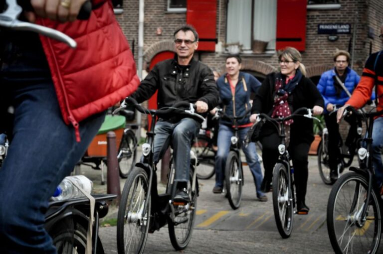 Amsterdam: Sightseeing Bike Tour With a French Guide