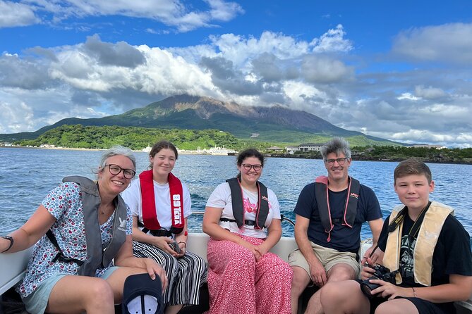 Boat Cruising in Front of the Active Volcano Sakurajima