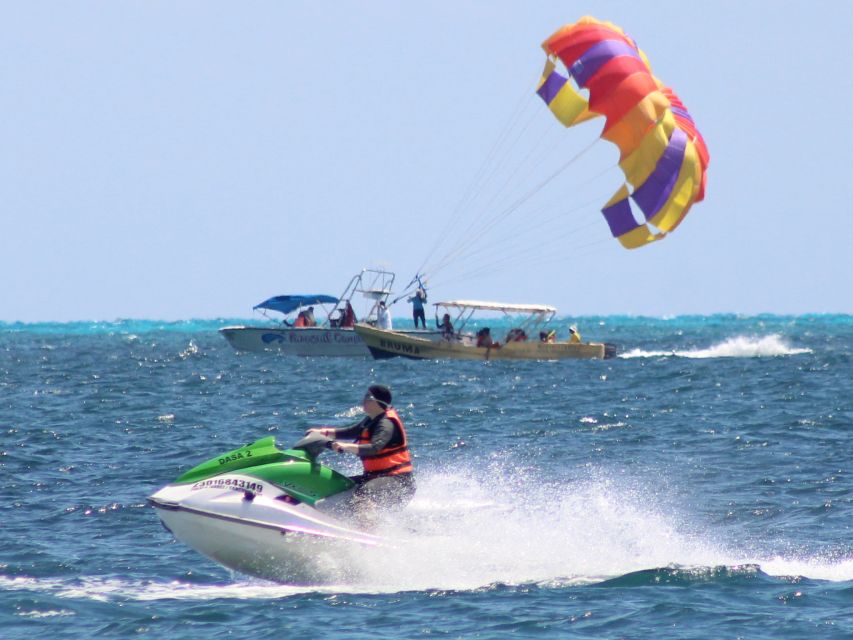 1 cancun parasailing and jet ski tour in cancun bay Cancun: Parasailing and Jet Ski Tour in Cancun Bay