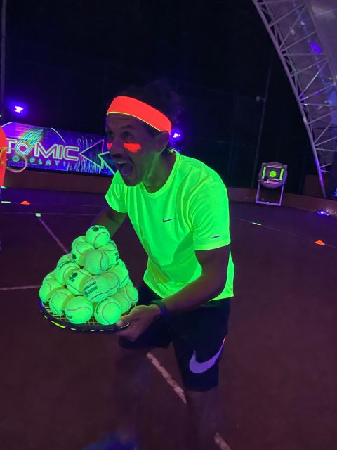 Cancun: Tennis Black-light Experience at RN Tennis Center