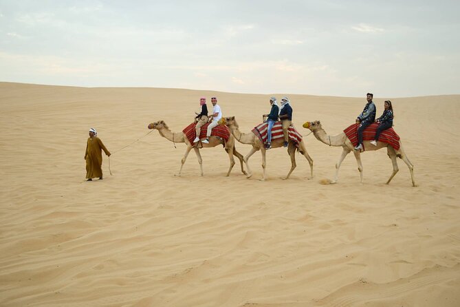 Desert Quad Biking Tour and Sand Boarding With Dinner in Dubai
