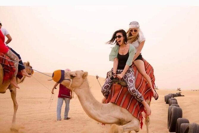 Desert Safari With BBQ Dinner, Camel Ride, Sand Boarding In Dubai